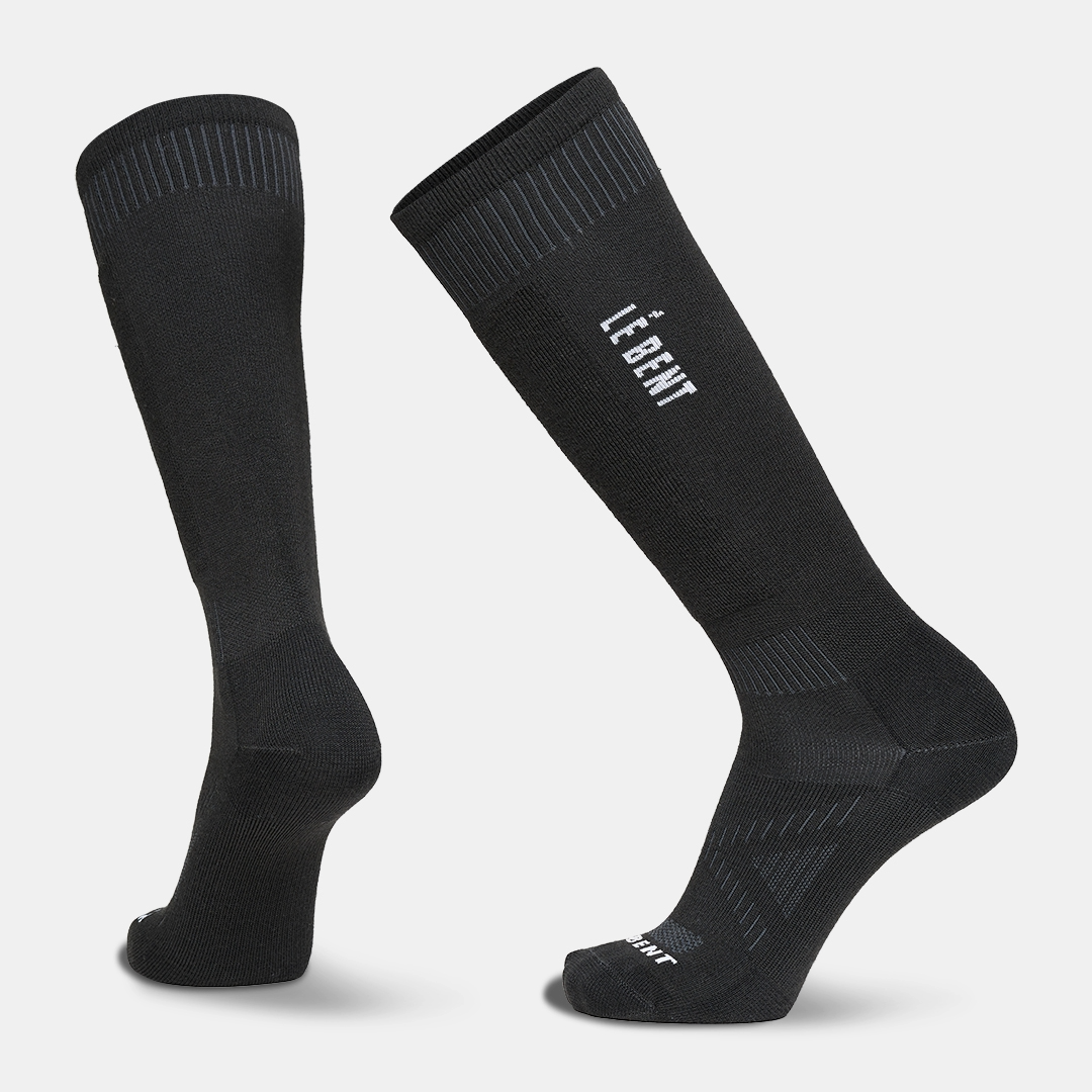 Pair of black athletic compression socks with white and gray accents, displayed against a light gray background.