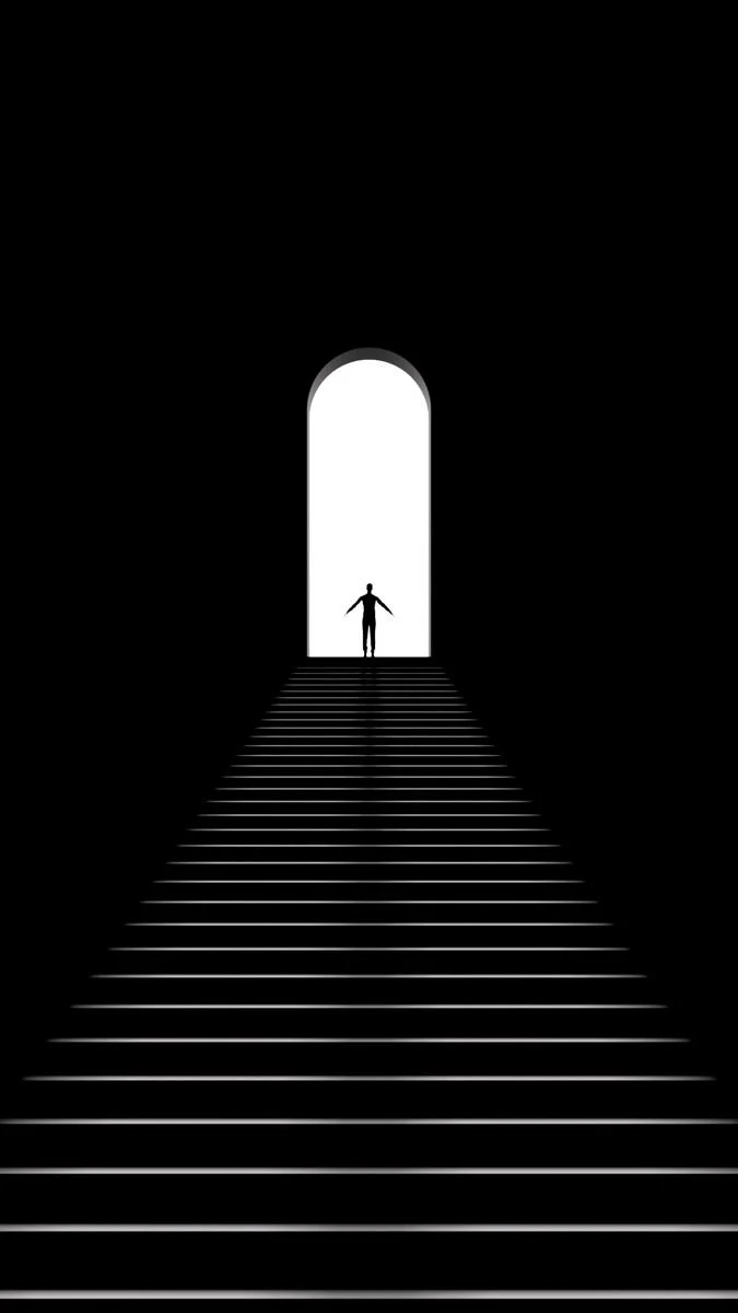 A silhouette of a person standing at the top of stairs in front of a bright, arched doorway.