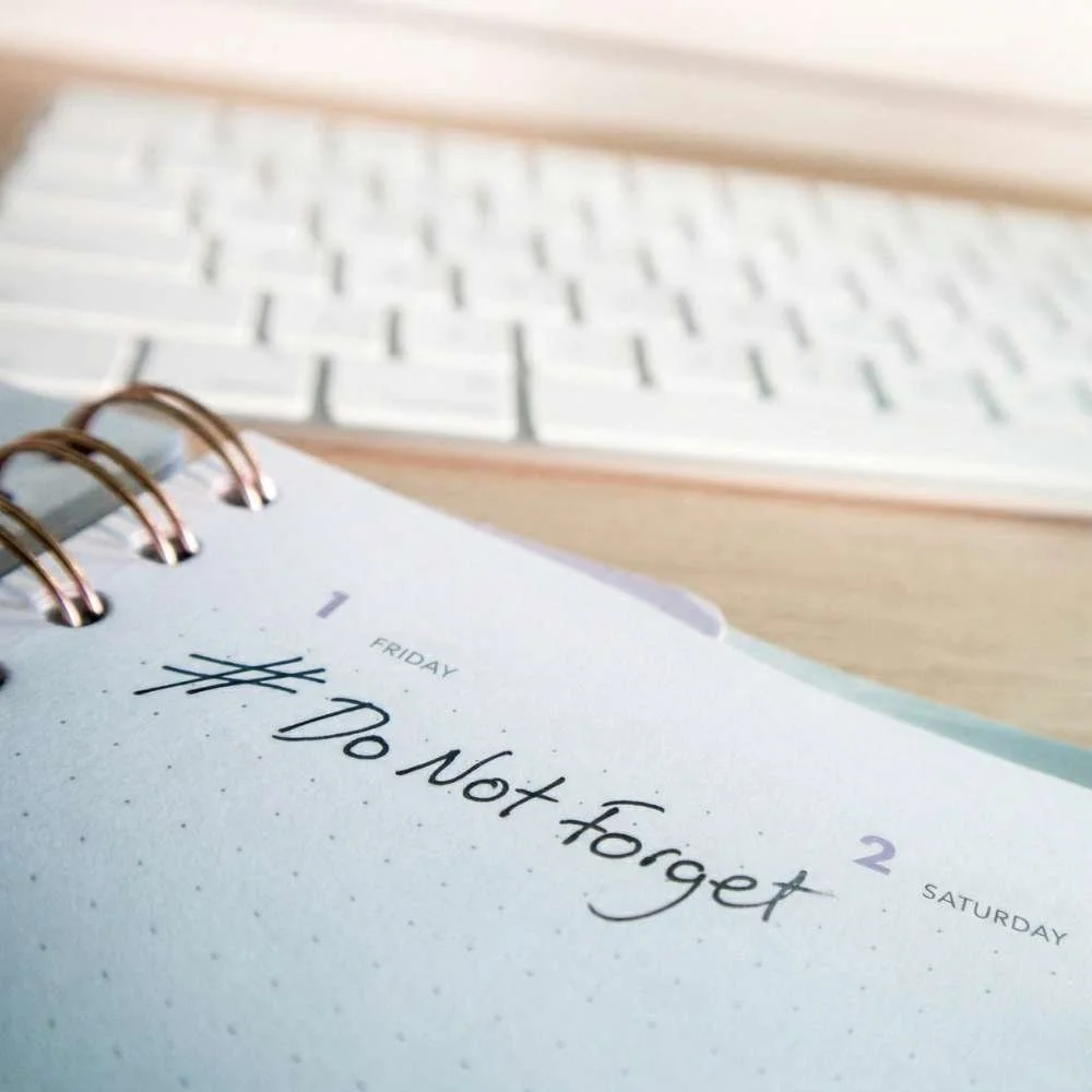 A calendar page showing the date Friday, the 1st, with a handwritten note that says '#Do Not forget'.