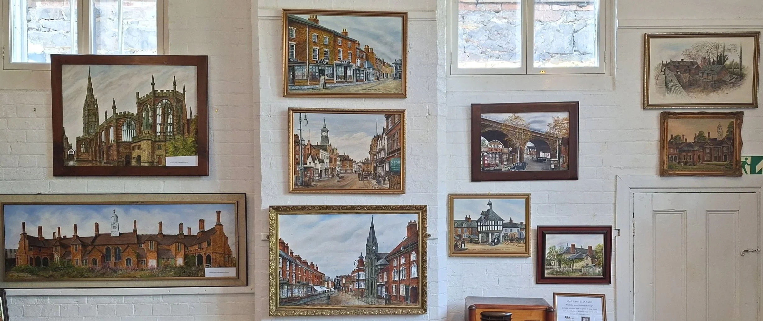Collection of Mick Shepperson art work on display in the Streather room, Chilvers Coton Heritage Centre