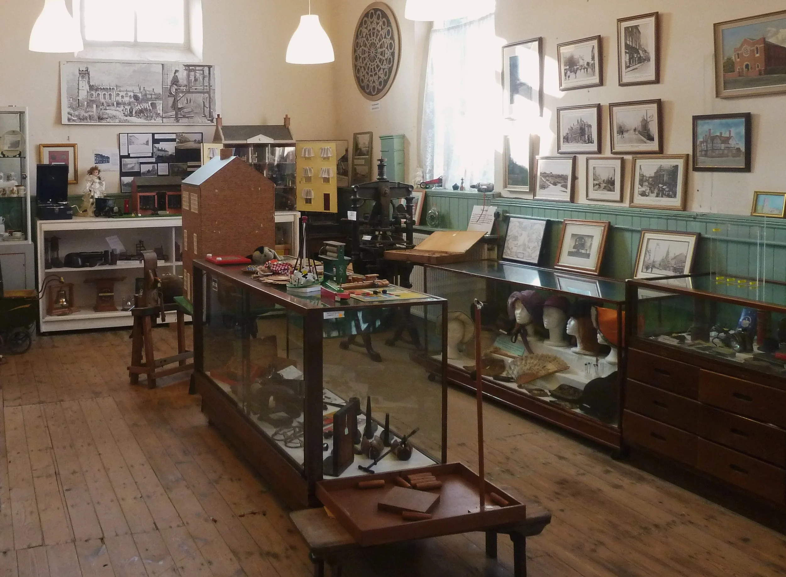 Museum room with various exhibits.