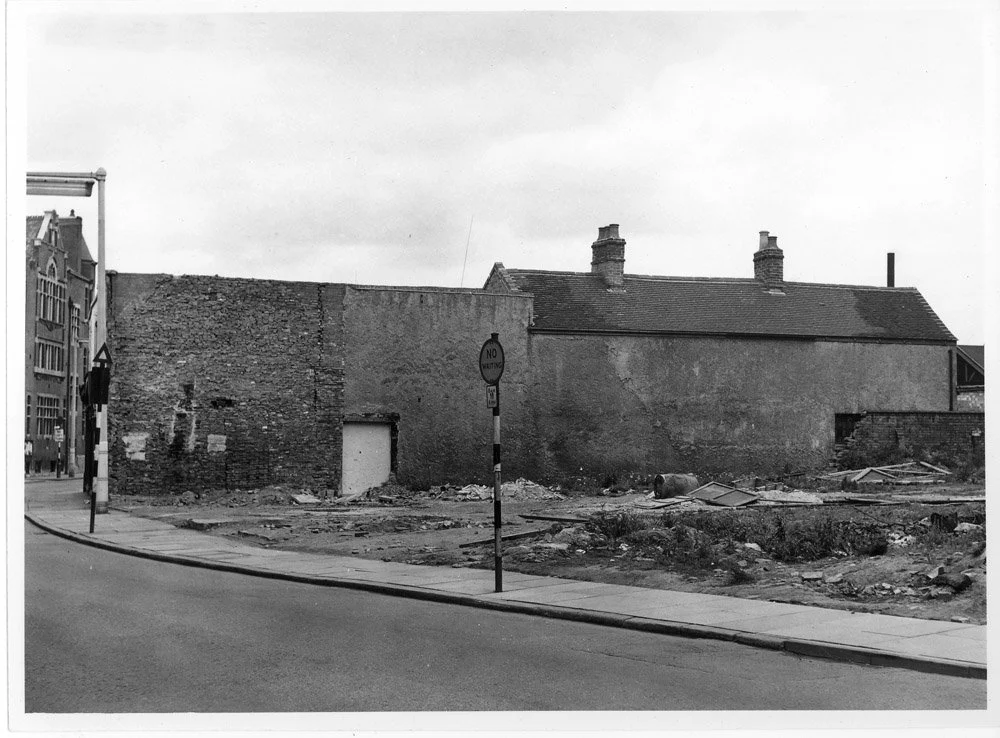 Photo taken from the corner of Wheat Street looking across to St Georges Hall at the Bond Gate/Newdegate Street junction. Warwick House would be eventually built on the cleared land.