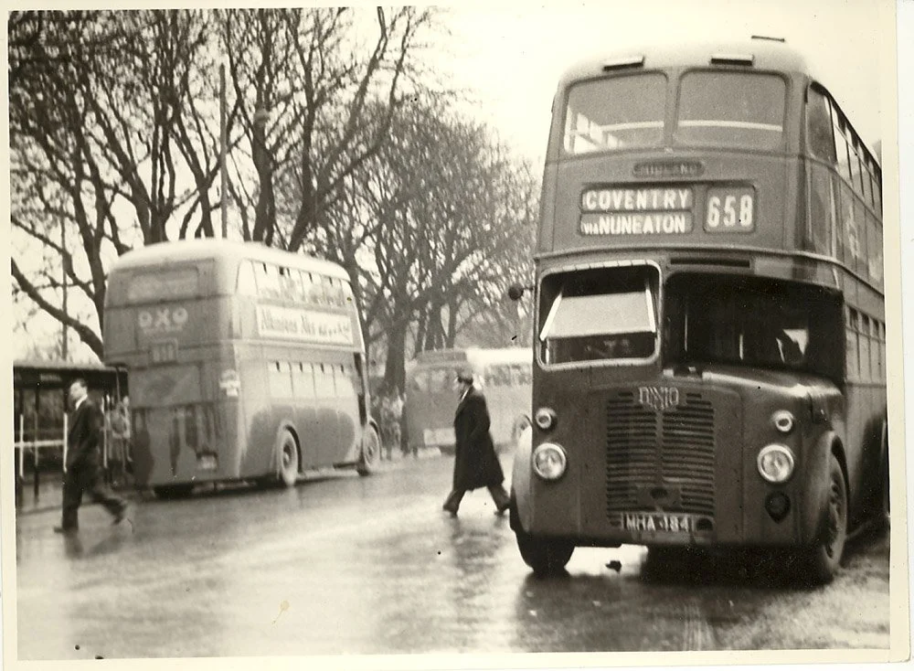 Bond Gate, year not known but probably late 50's early 60's. The 'OXO' bus on the left is parked by the bus shelters alongside the river. The shelters were removed and became a taxi rank.
