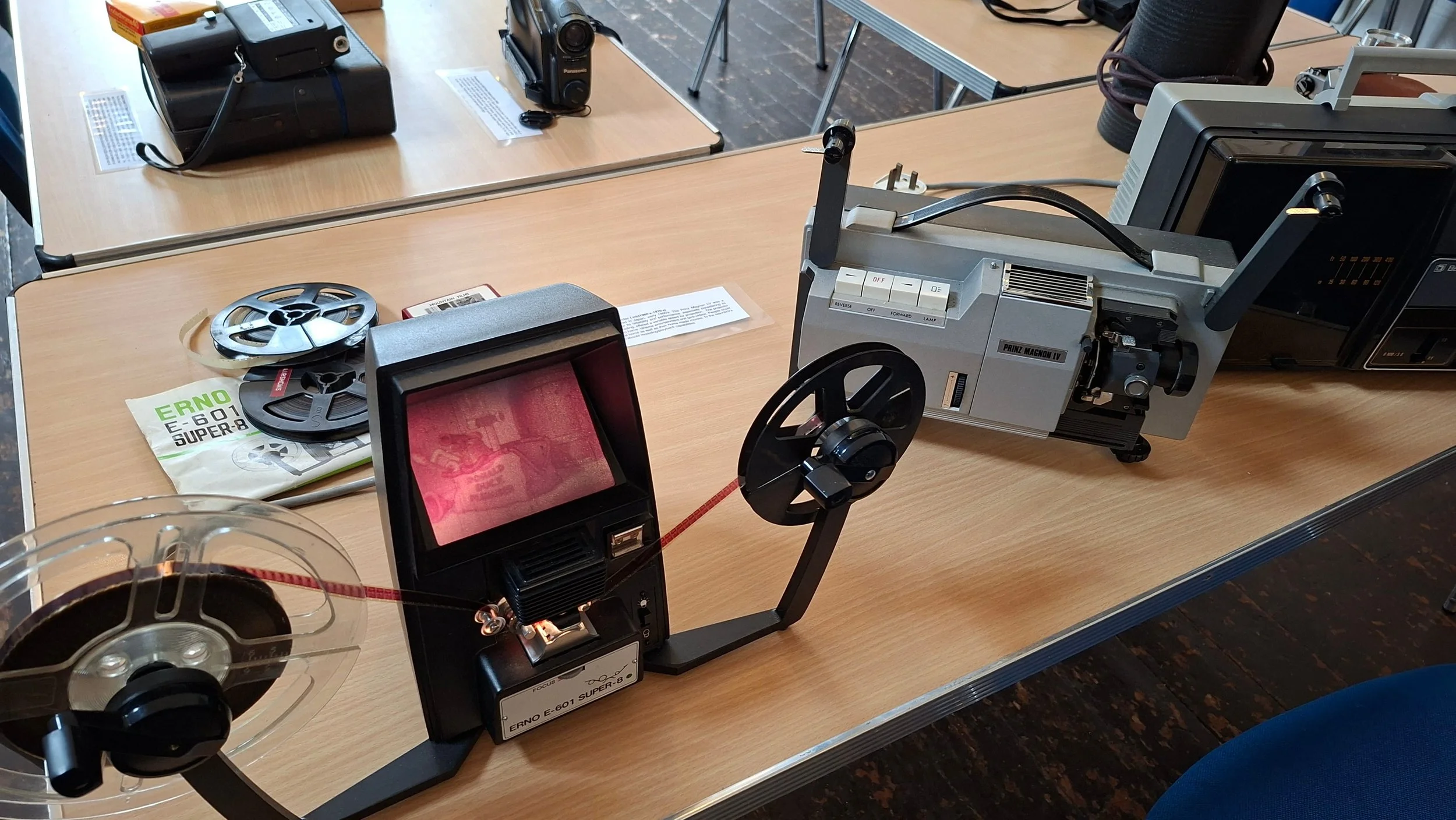 The Erno E-601 Dual 8 is a vintage, manual film editor and viewer from the 1970s used to edit Standard 8mm and Super 8 movies. It features a built-in screen, motorised rewind capabilities, and an integrated film splicer. Also, the Prince Magnon Super
