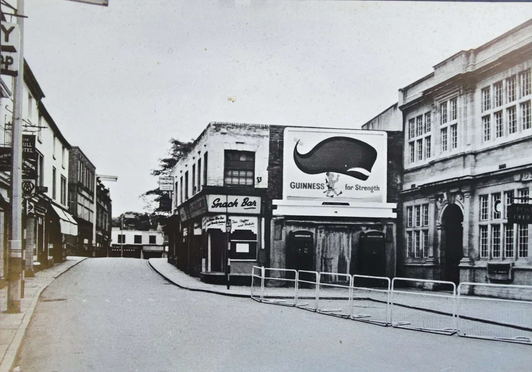 Bridge Street before it was widened in 1959. The old Post Office is on the right hand side and on the corner stands the Snack Bar, haunt of the Teds through the late 50’s.