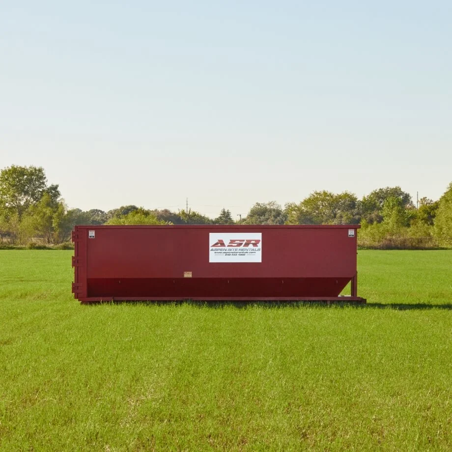 Red roll-off dumpster rental for construction debris in North Texas