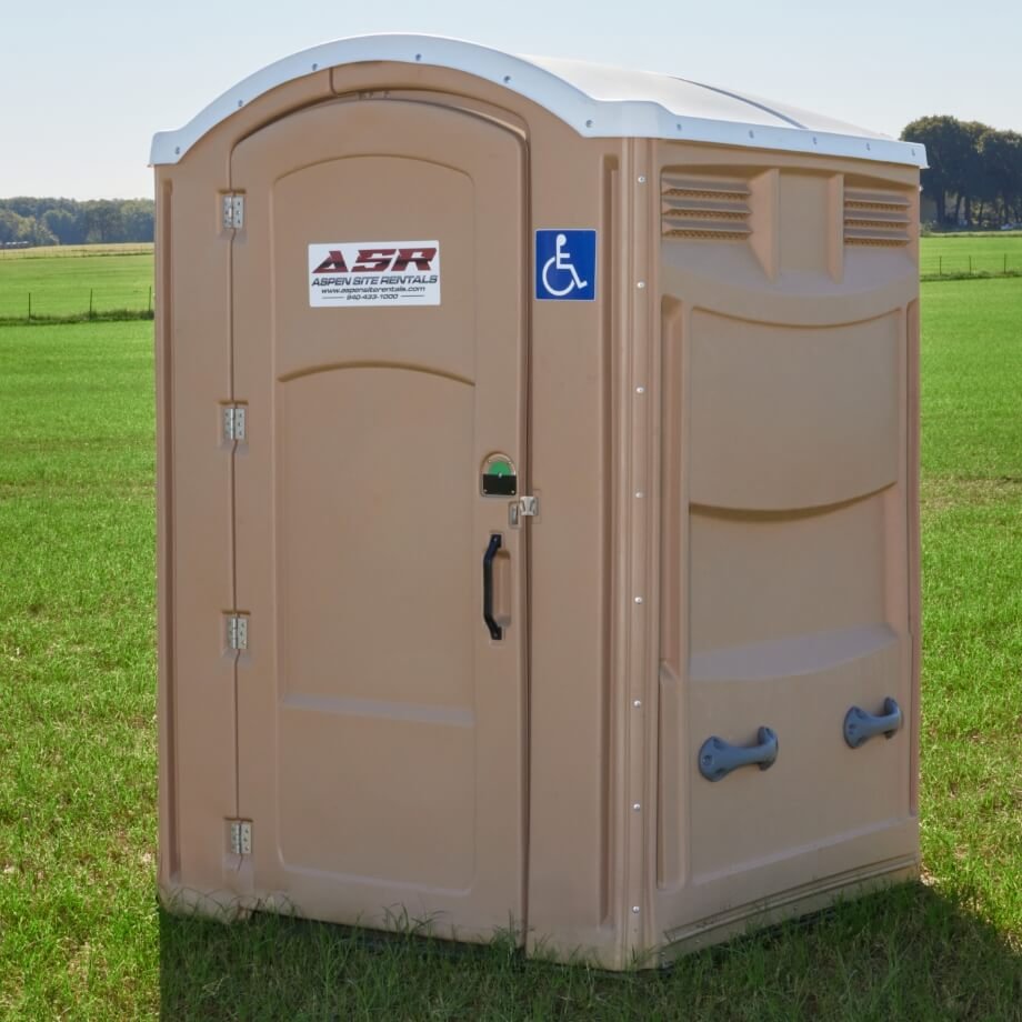 ADA-compliant wheelchair-accessible portable restroom with handrails