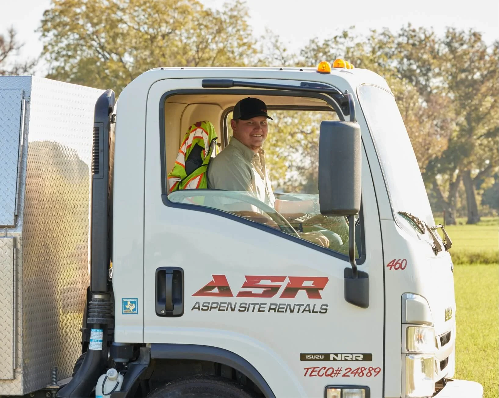 Driver at the wheel of a company service truck