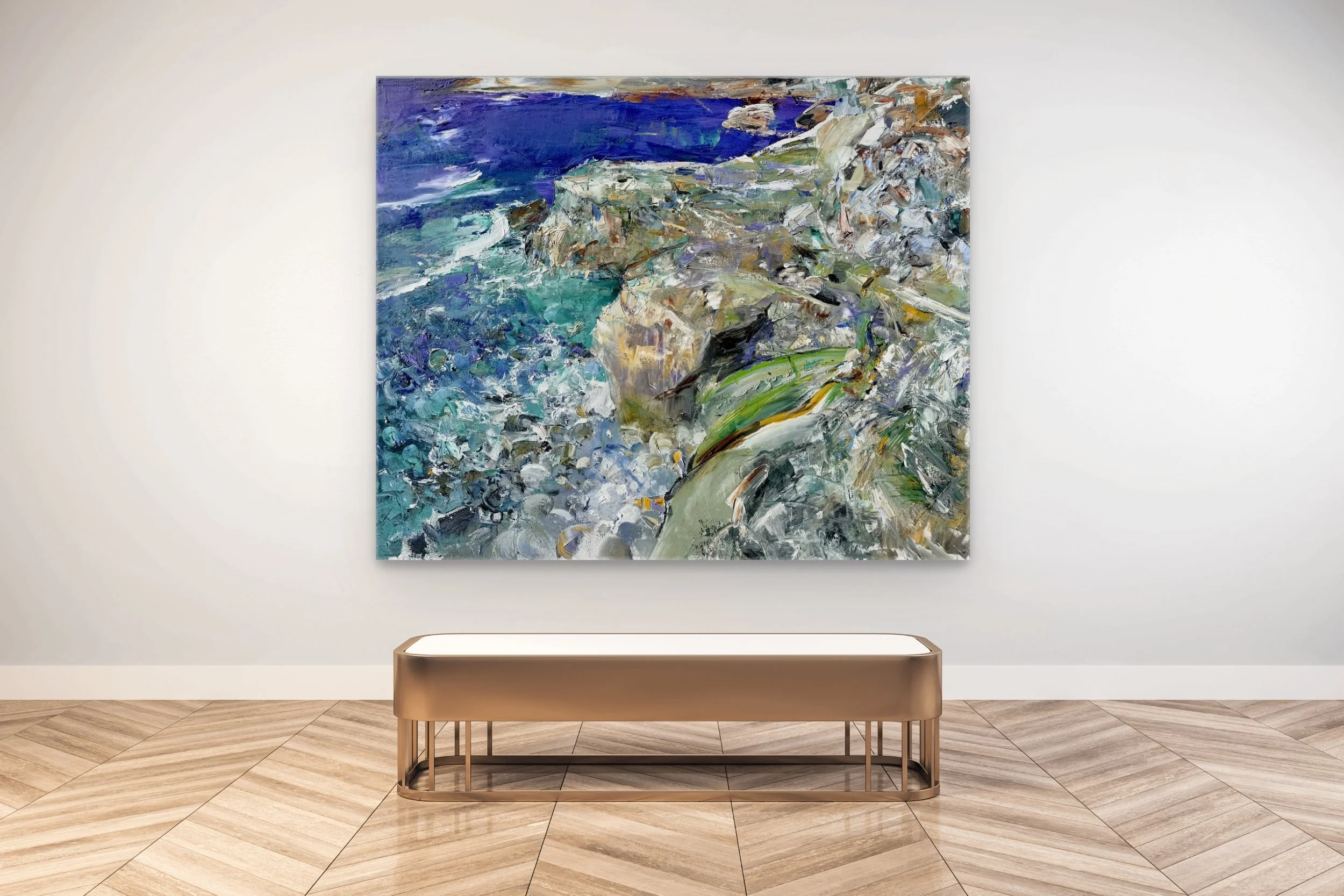 A colorful abstract painting of a rocky coastline with blue ocean waves on a white gallery wall.