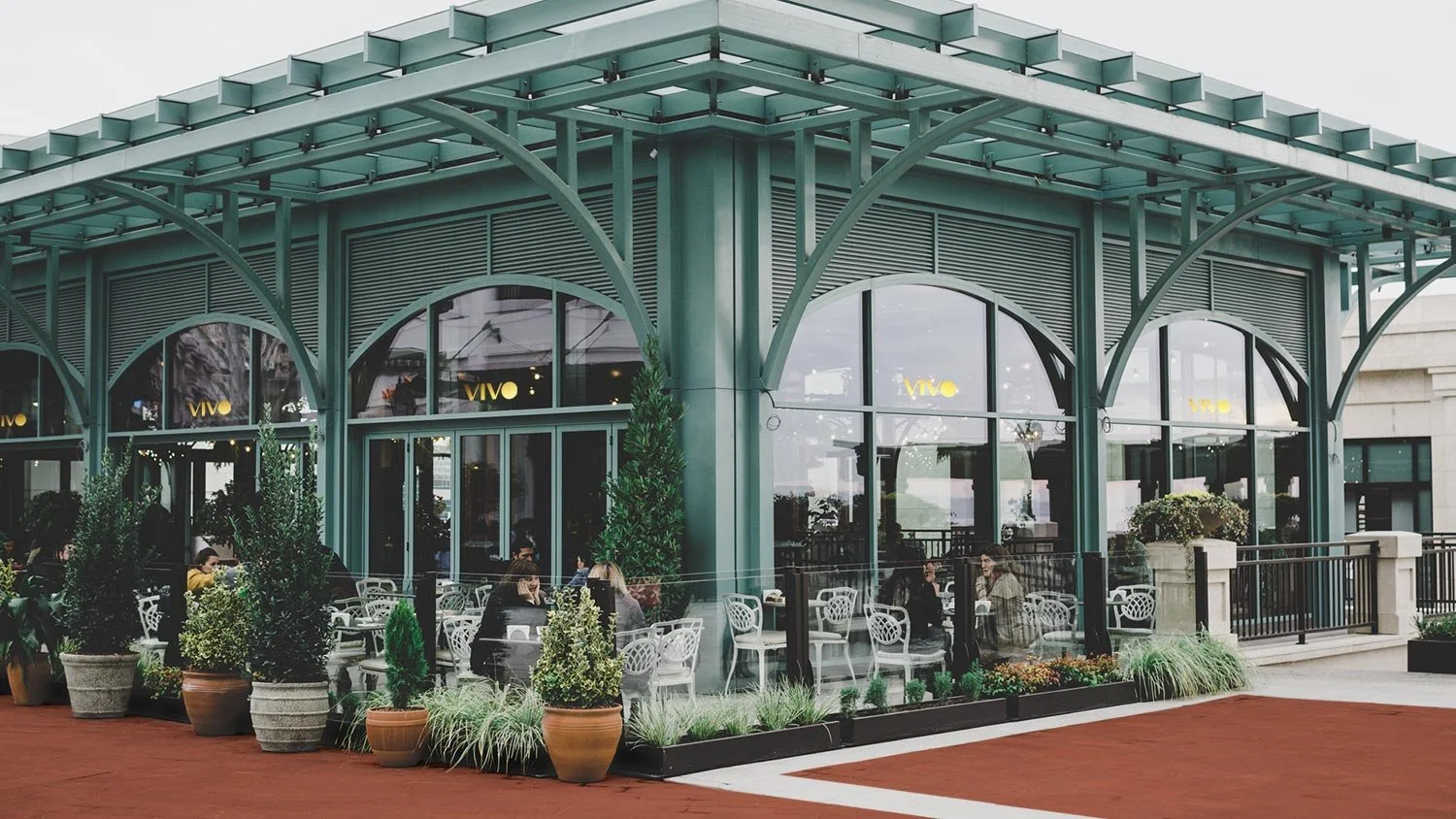 exterior of greenhouse store with patio