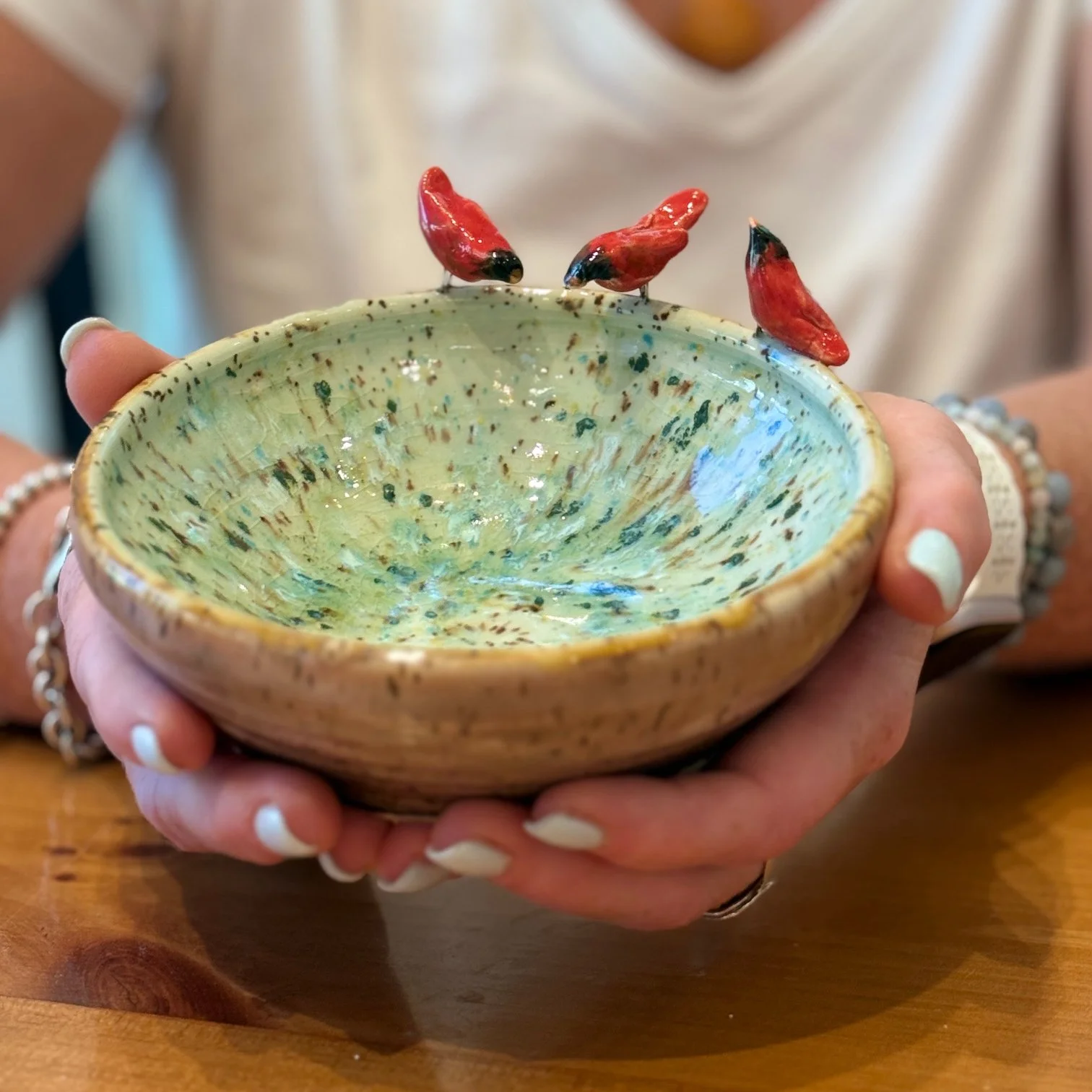 Three Cardinals on a Dish