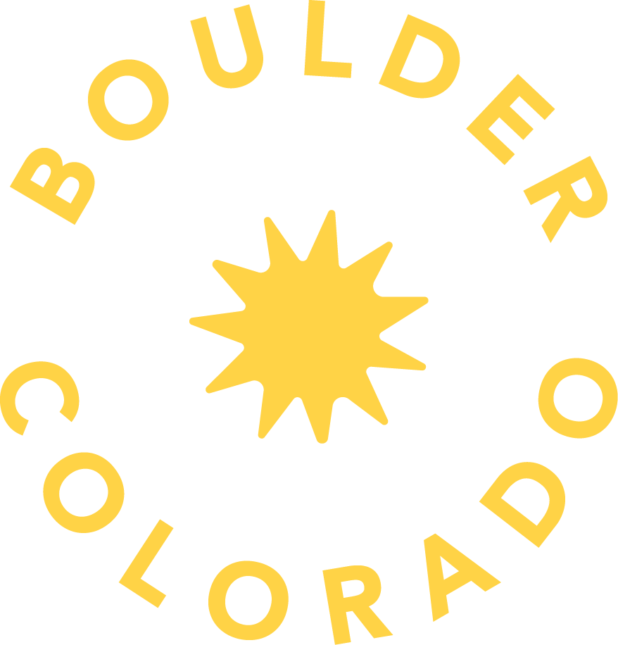 Logo of Boulder Colorado with a yellow starburst in the center and the words "BOULDER COLORADO" curved around it in yellow text.