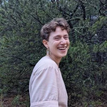 A headshot of Serena laughing outside