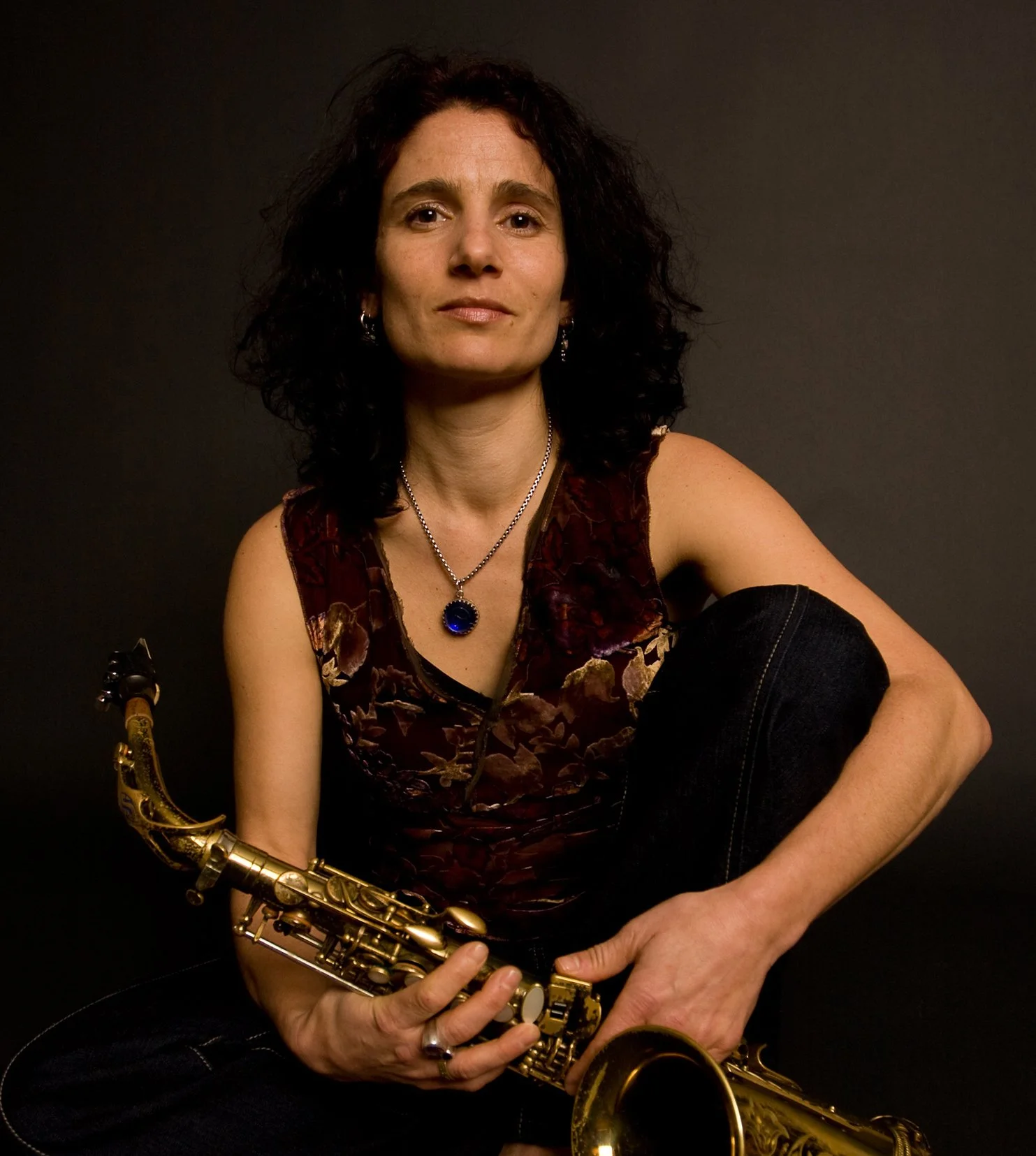 A photo of Jessica holding a saxophone