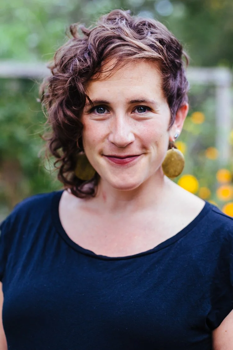 A headshot of Ilana looking at the camera
