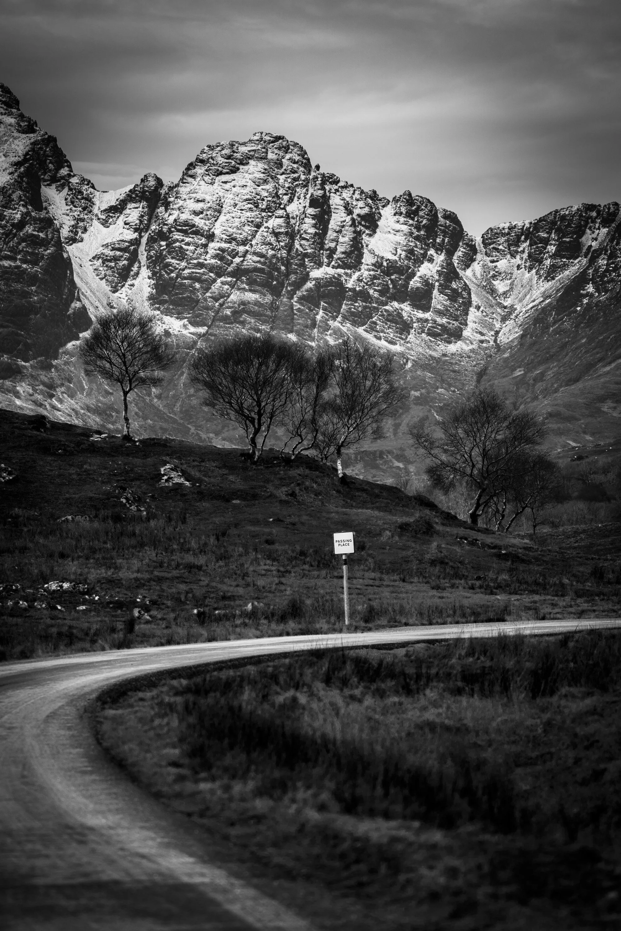 Black and white mountain road representing the journey from concept to market.