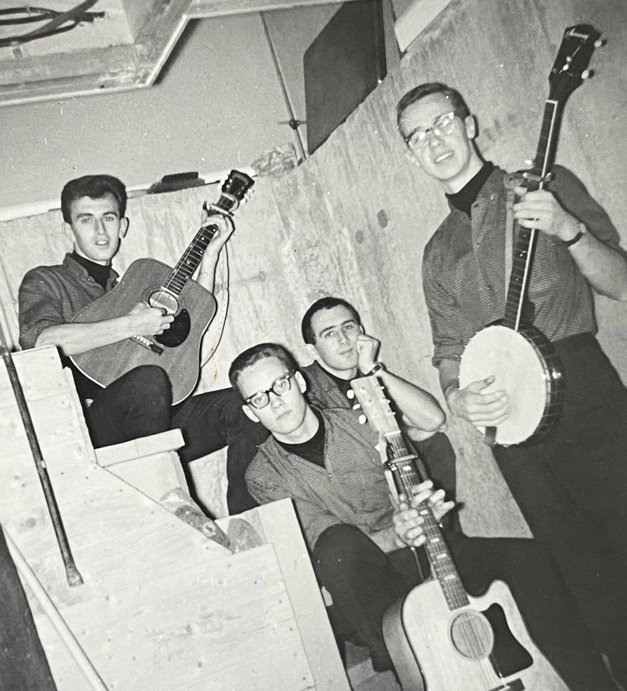 When Norman Pierce left The Ramblers, Mike Waye joined bringing his great skills with five string banjo, guitar and vocal harmony. In the Tobias basement. T-B: Ken, Tony, Bob, Mike (Standing). 1964.