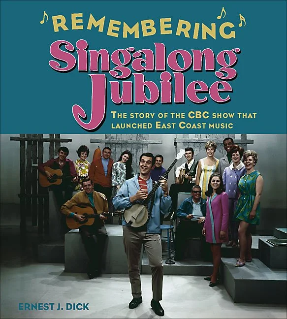 Cover of book by Ernest J. Dick. Ken is in the back row of the photo.