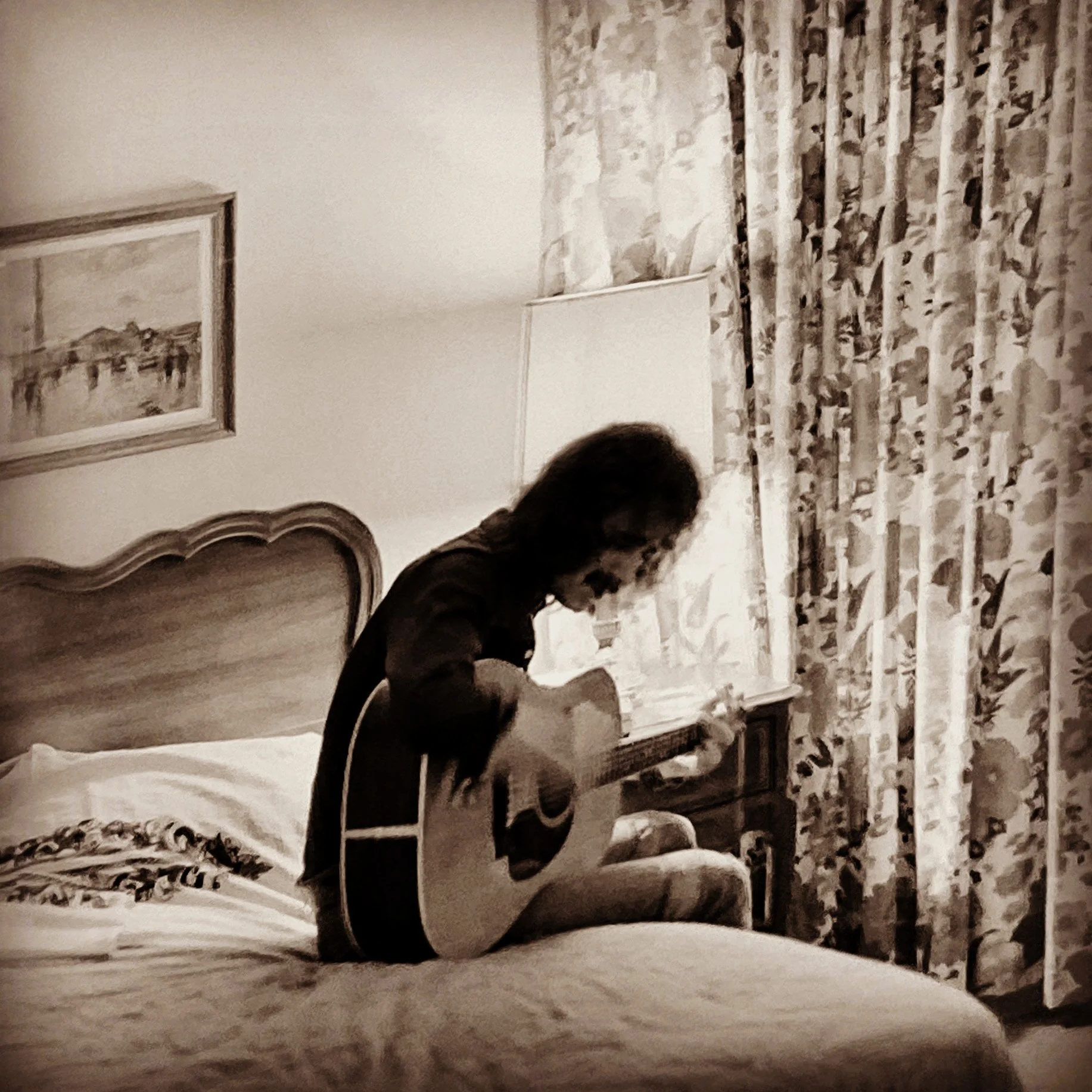 Ken in moody setting at the Fifth Avenue Hotel, New York City during gig at the Bitter End. 1974. Photo: Tony Tobias.