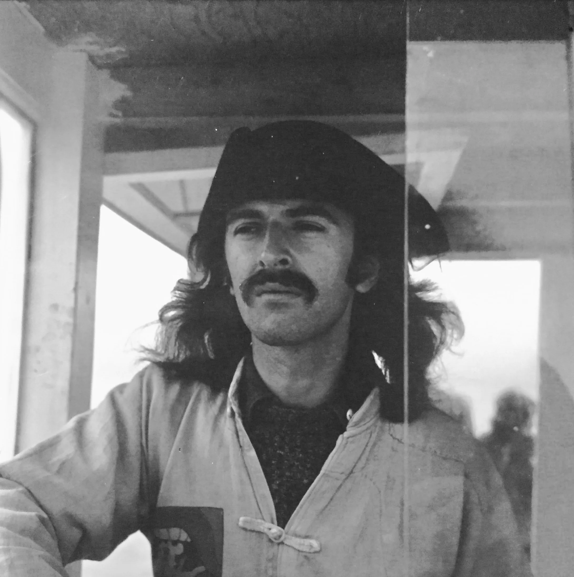 Ken in the cockpit of his Grandfather's fishing boat in Beaver Harbour, NB. 1971.
