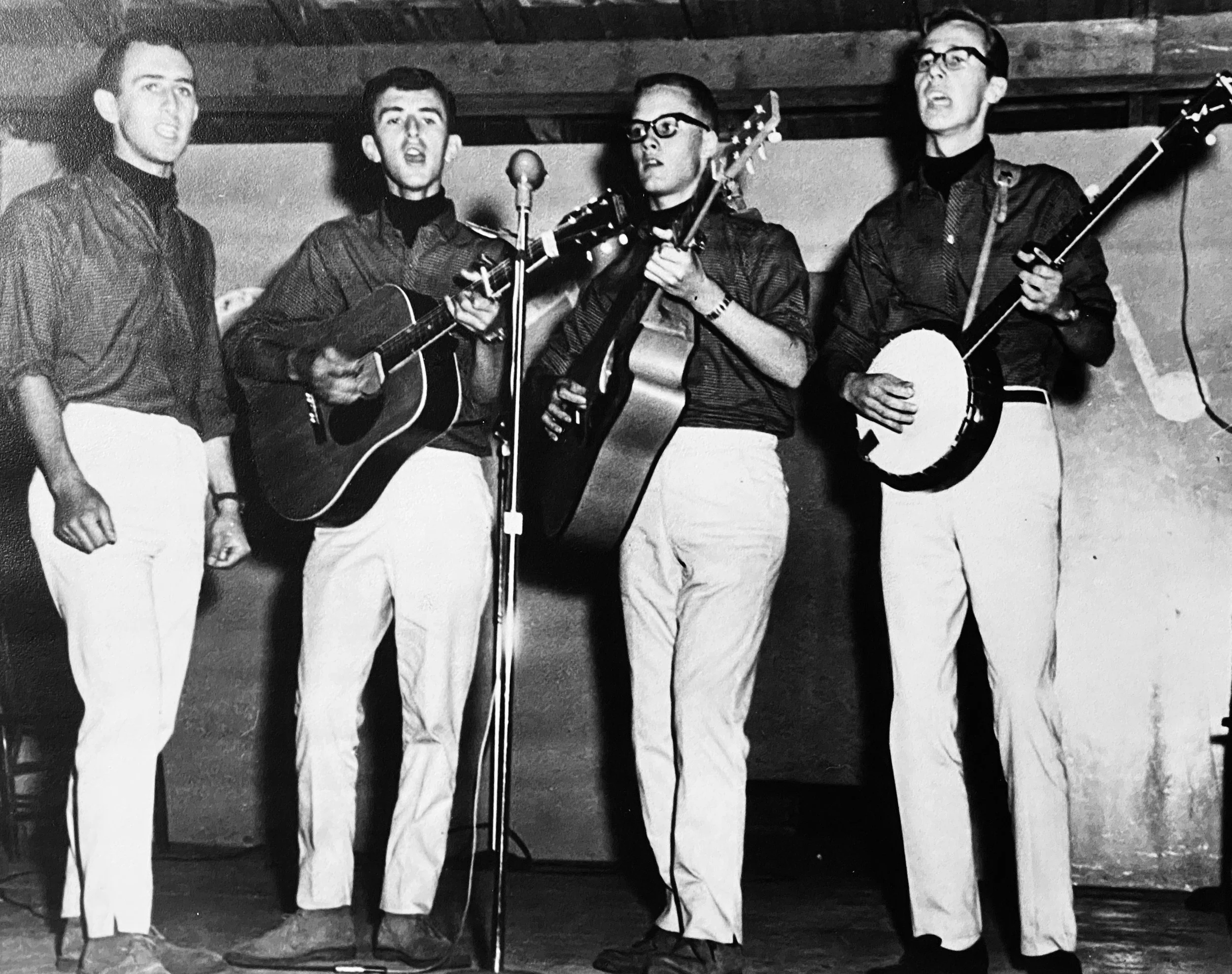 As time went on The Ramblers became more polished and professional. Started getting festival gigs all over the Maritimes. The Rambler's image emulated the popular folk groups of the time. Photo: McAdam Village Summer Fair. L-R: Tony, Ken, Bob, Mike. 