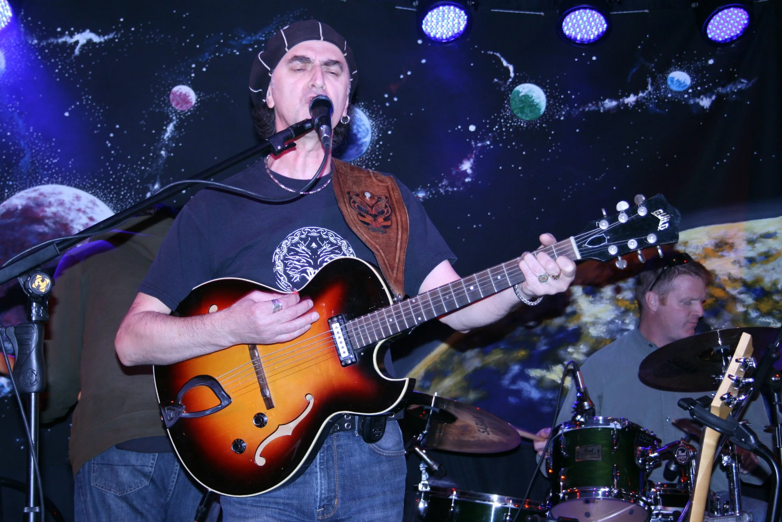 Ken performing with his band at Blue Olive 2008. Credit: Tony Tobias.
