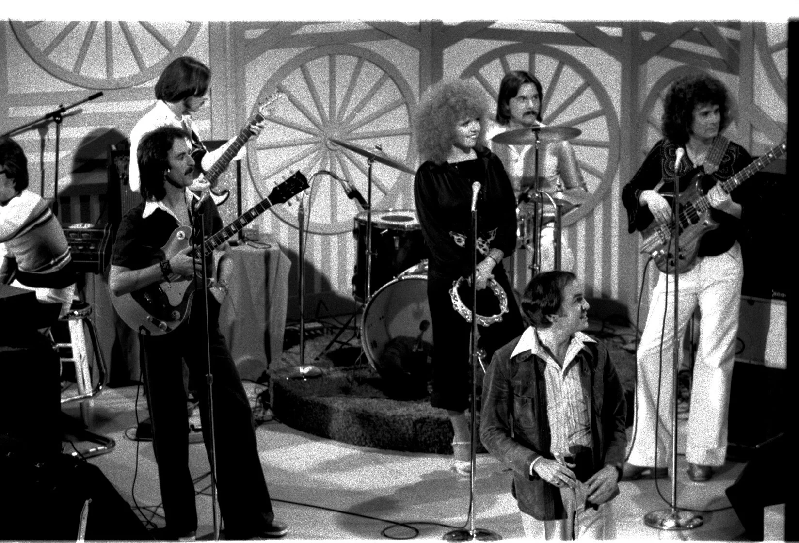 Ken and his band taping the CBC TV show  "Sounds Good". Ken's good friend and TV Director Jim McKenna is in the foreground. 1976. L-R: D. Michael Mooney, Davey Murrell, Ken, Elaine Overholt, Jimmy Staid, Jim McKenna, Bill Scullion. photo: Tony Tobias