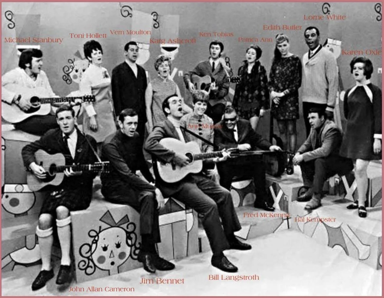 The cast of Singalong Jubilee with Ken at back with his guitar.