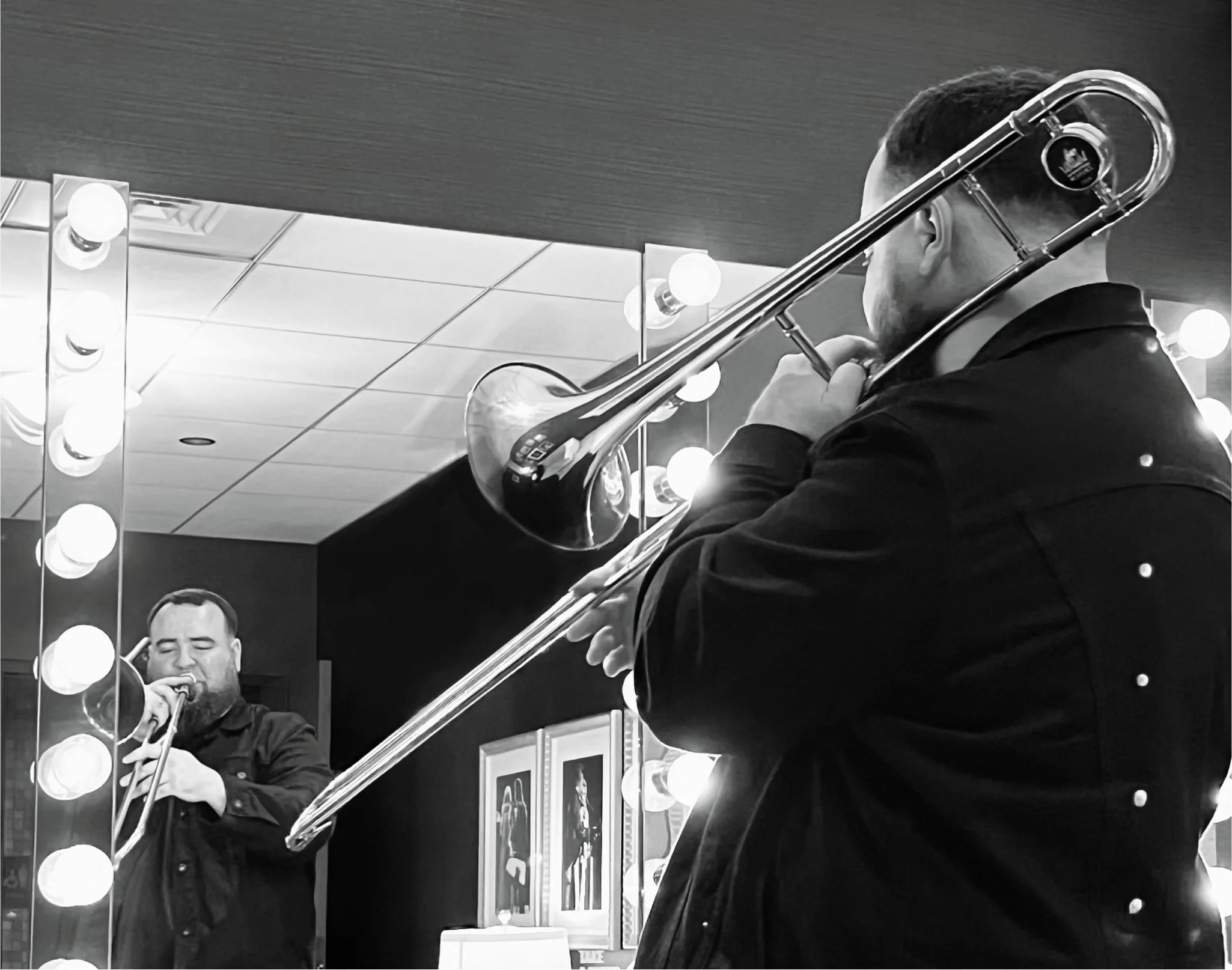 Scott B. Hearn warming up on trombone backstage at the Grand Ole Opry in Nashville