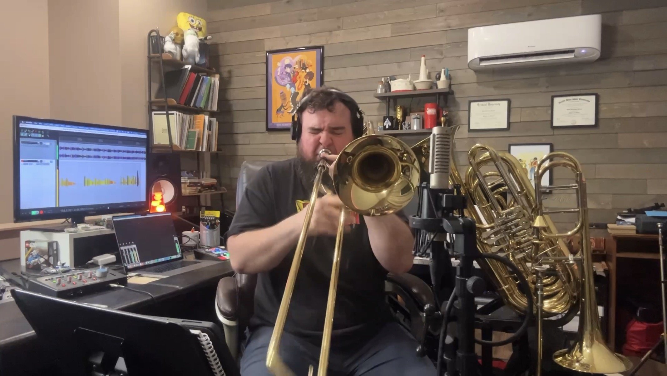 Scott B. Hearn recording trombone in his home studio
