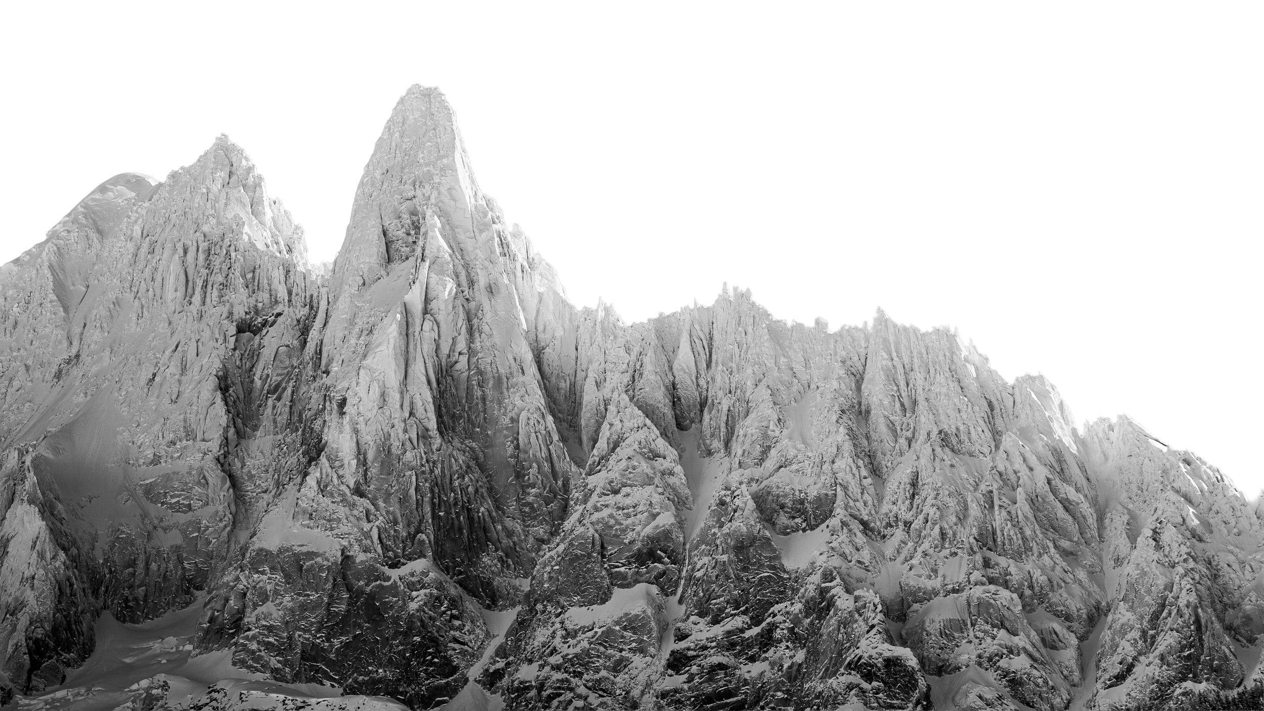 Montagne enneigée avec des pics escarpés et un ciel noir en arrière-plan - Chamonix Mont-Blanc -  Alps Films Equipment Rental.