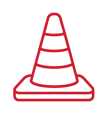 Red construction cone on a sidewalk