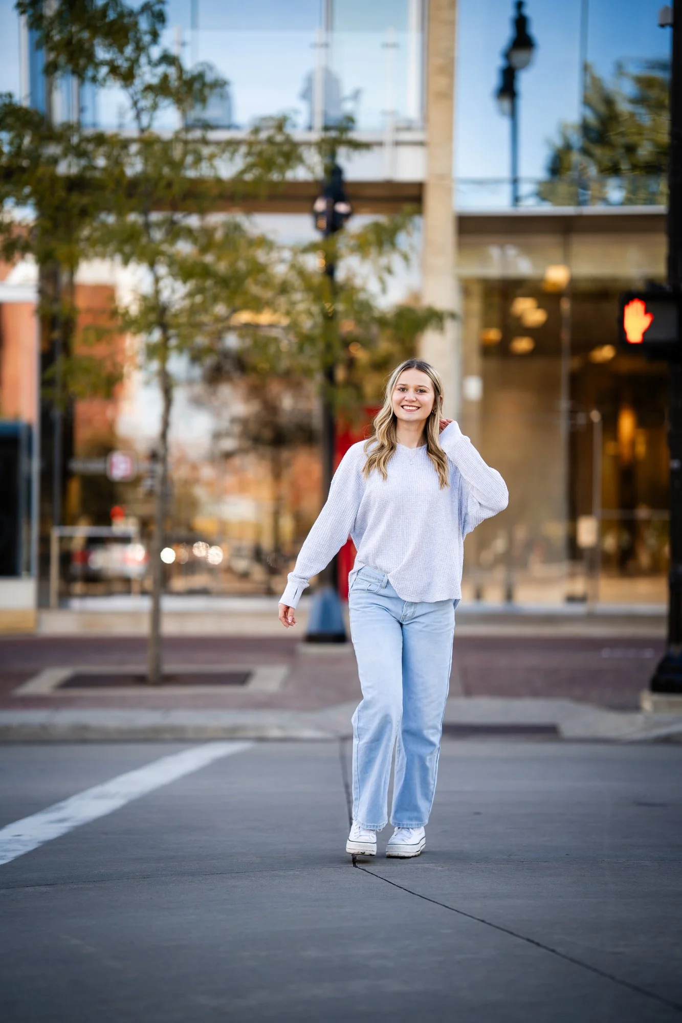 Jevon Photo senior photographer, downtown Madison, WI, on the square.