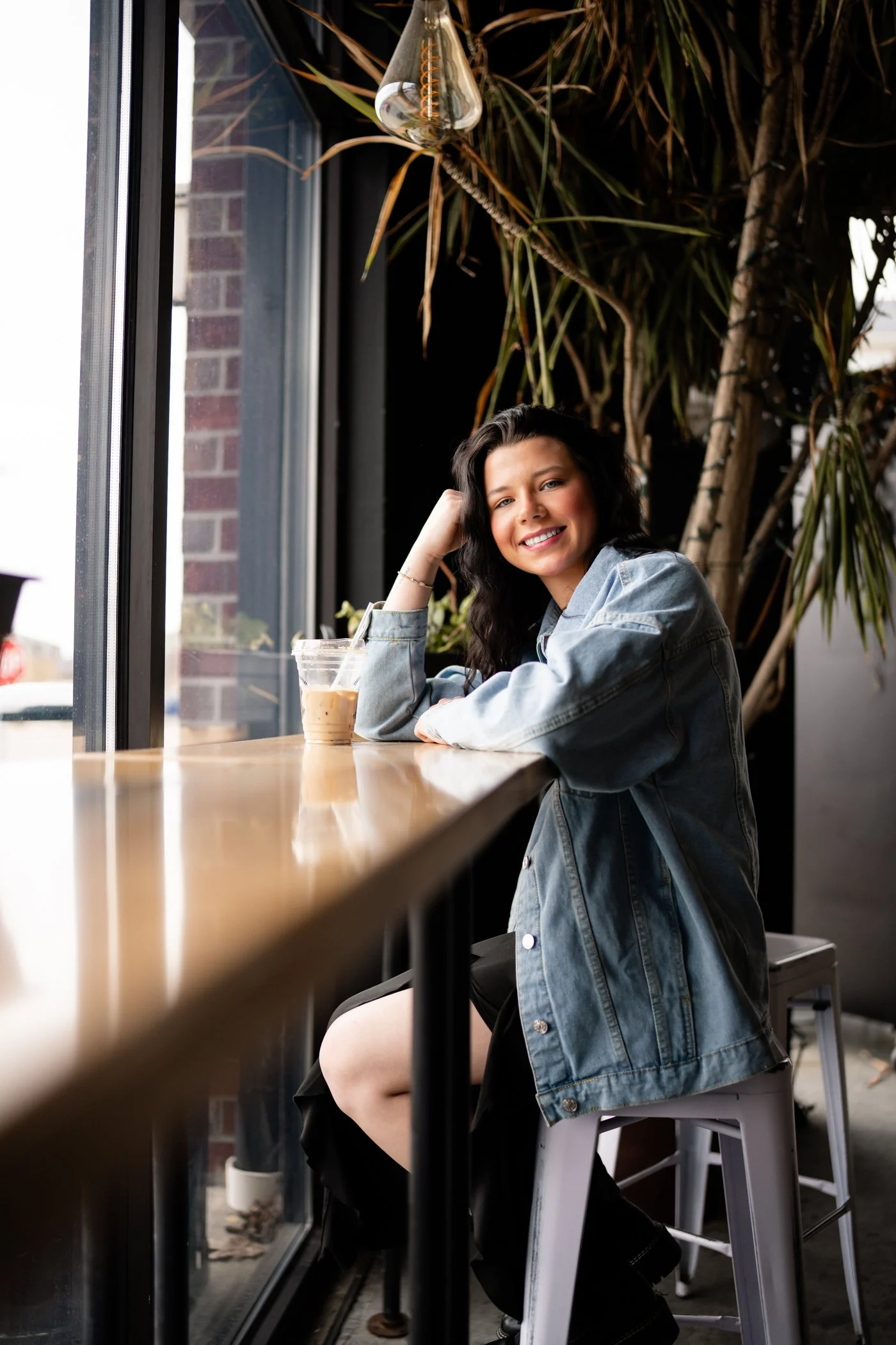 Senior photographer, Jevon Photo in Sun Prairie at Grace Coffee.