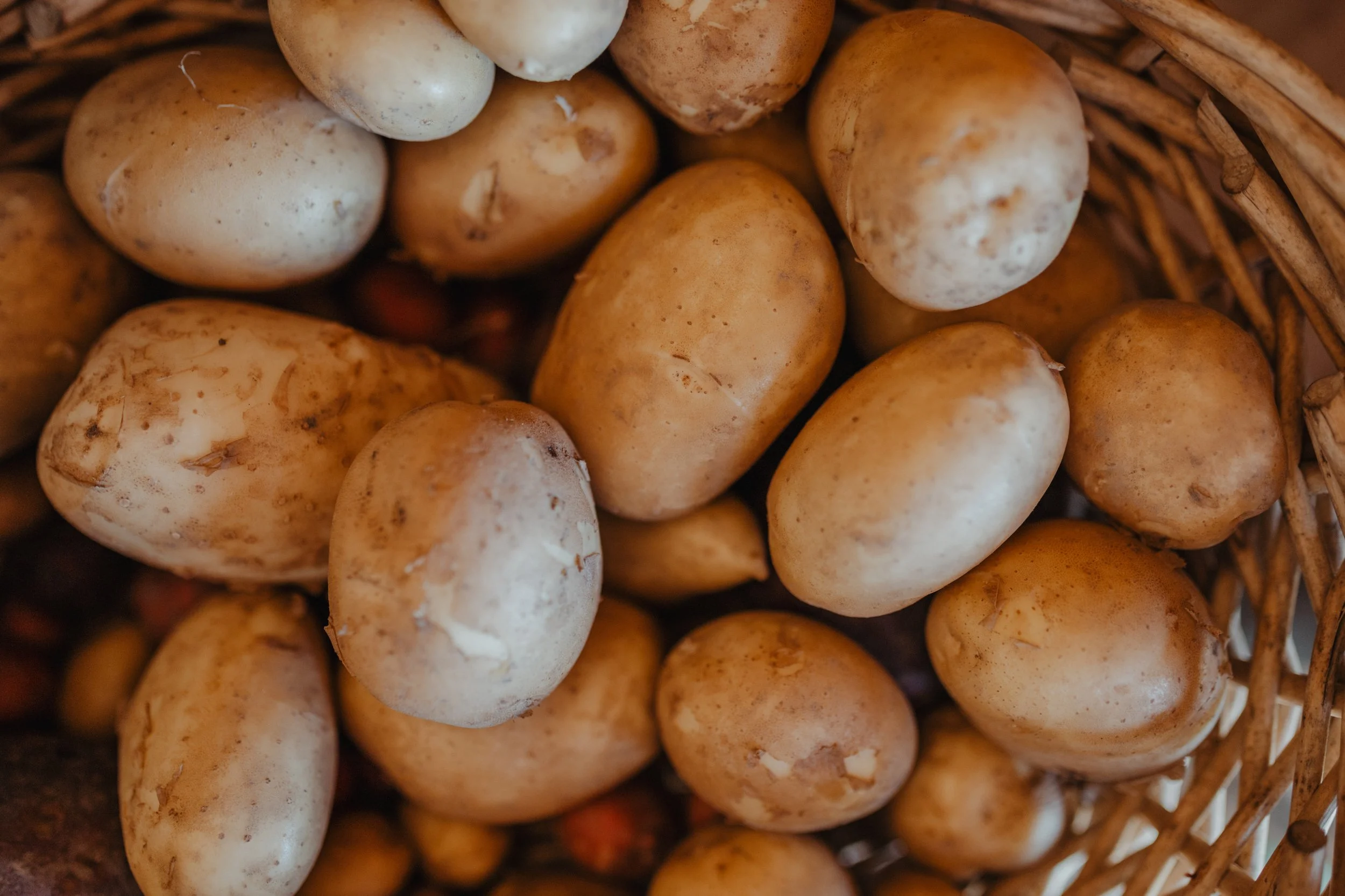 Brown potatoes in a basket