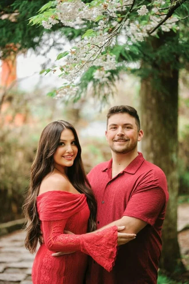 Bride and groom outdoors, bride glowing with Caramel Tan airbrush tan.