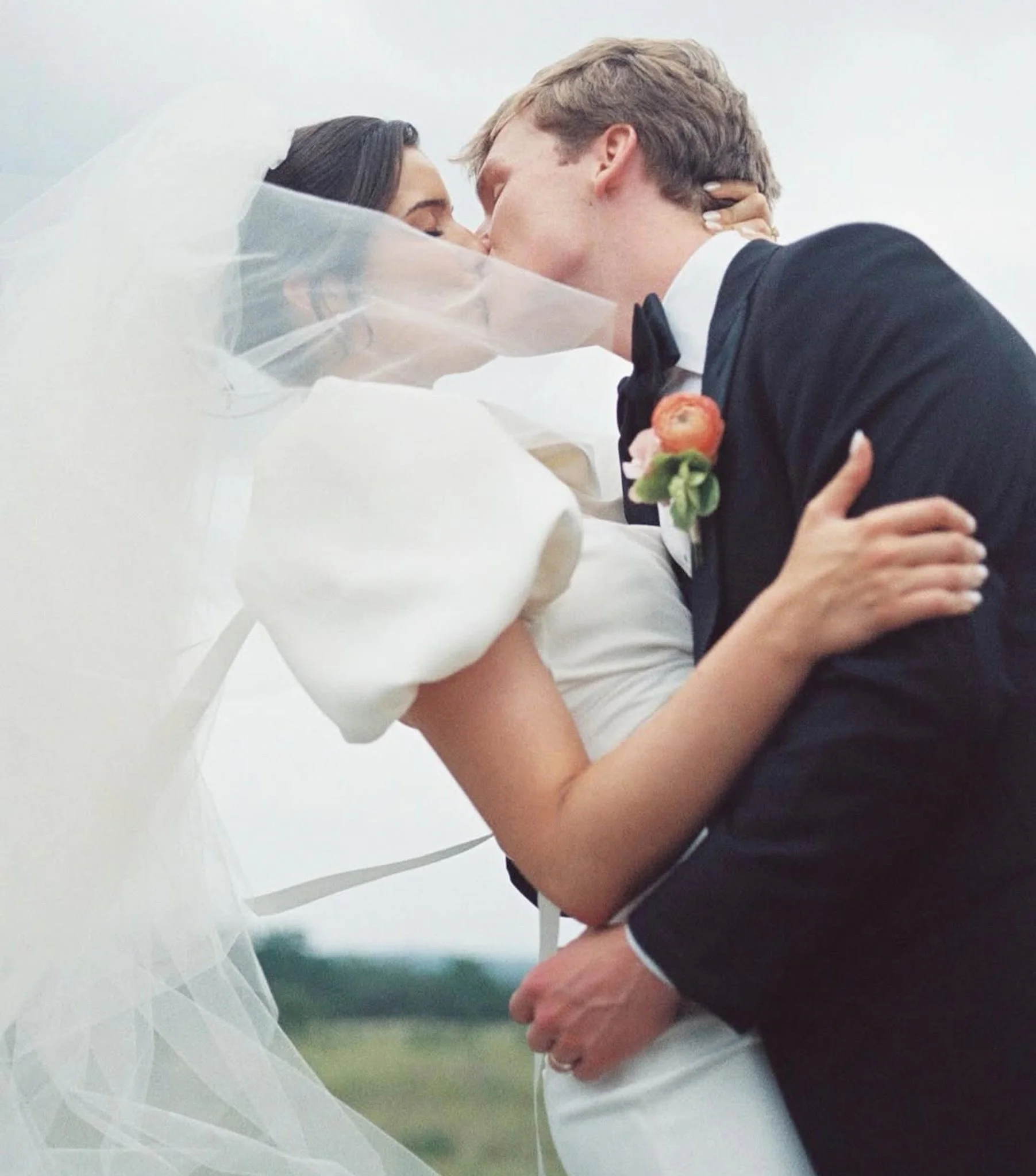 Bride in lace wedding dress with flawless Caramel Tan spray tan glow before her Austin wedding.