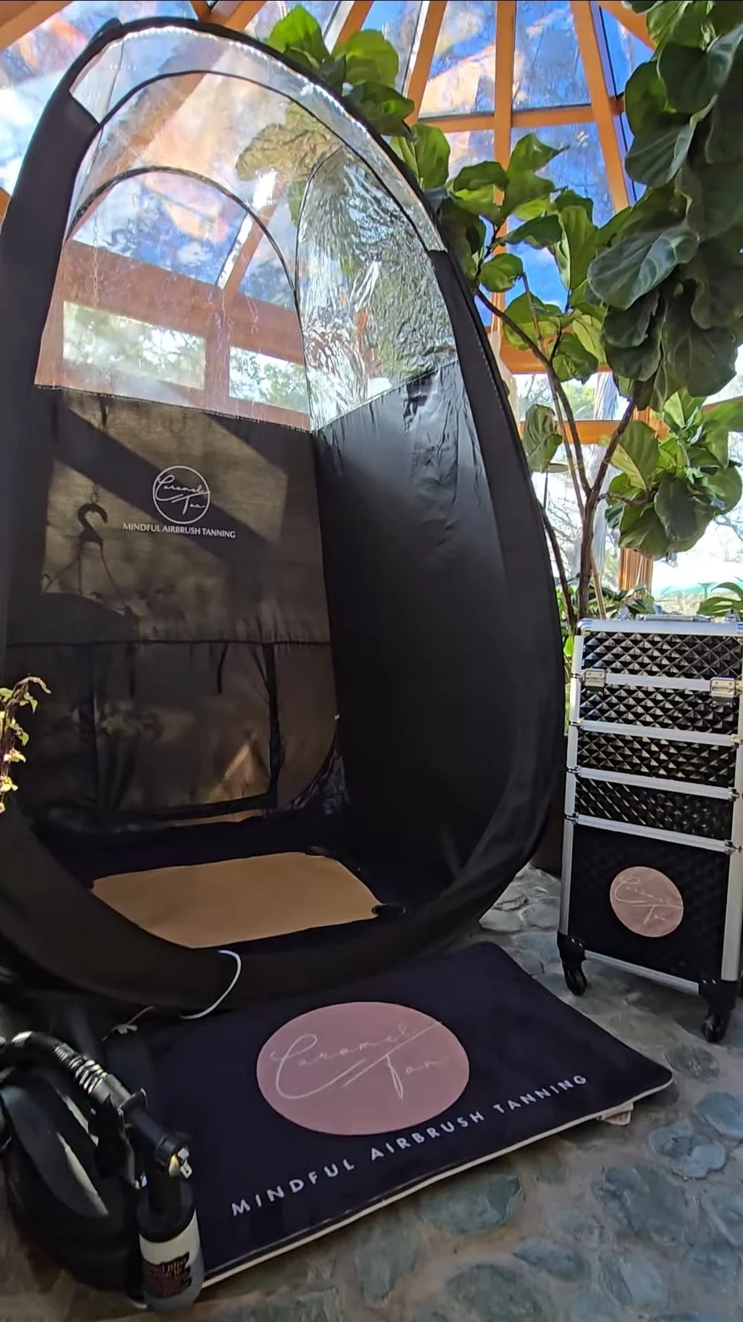 Professional mobile spray tan station fully set up for a Caramel Tan appointment, offering a clean, convenient, in-home glow.