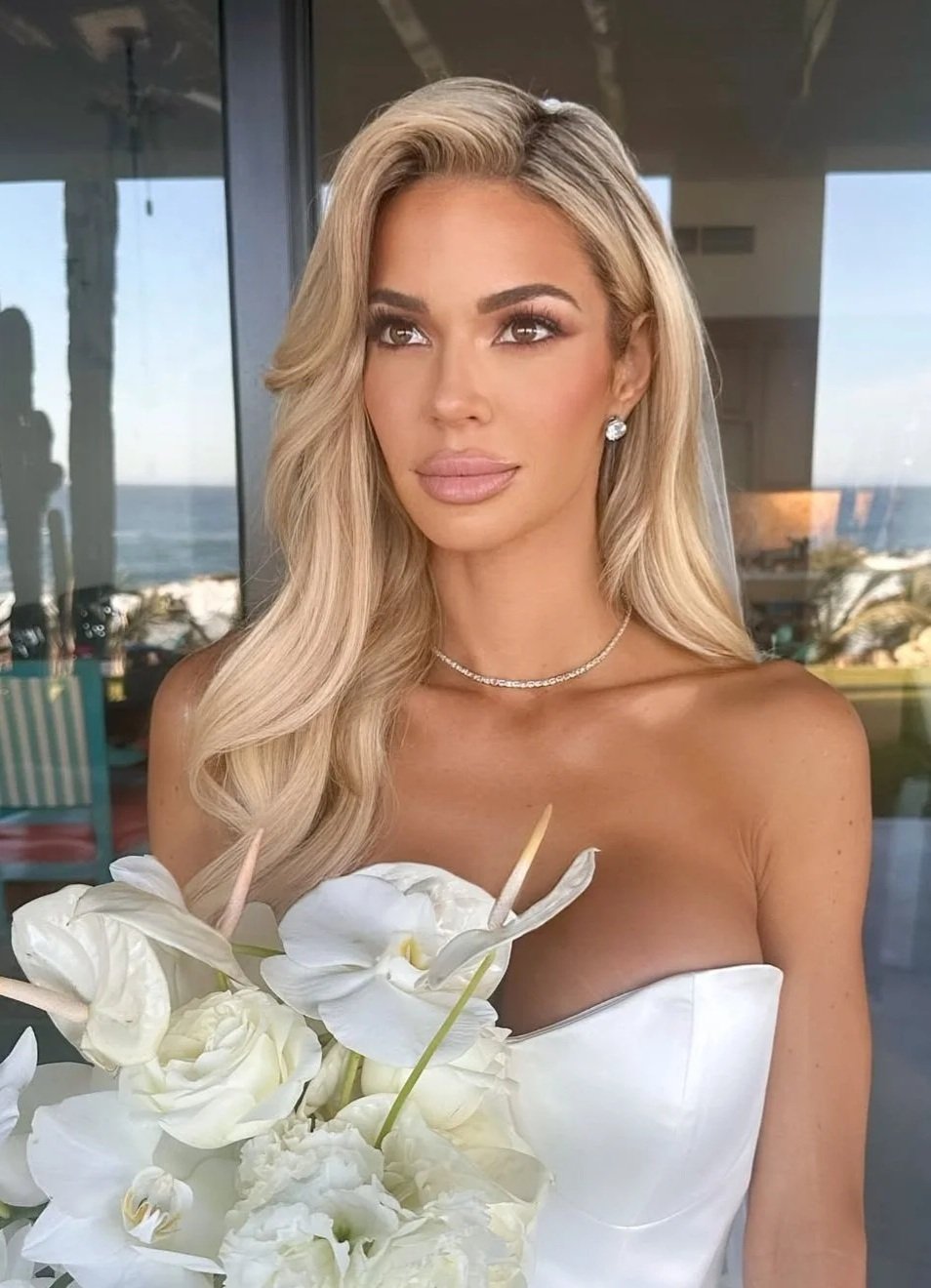 Custom bridal spray tan by Aurenza Studio, formerly Caramel Tan, featuring beautifully bronzed skin and natural-looking results.