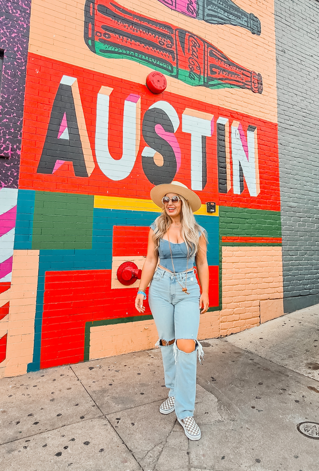 Amy, founder of Aurenza Studio, wearing a natural-looking custom spray tan in Austin, Texas.