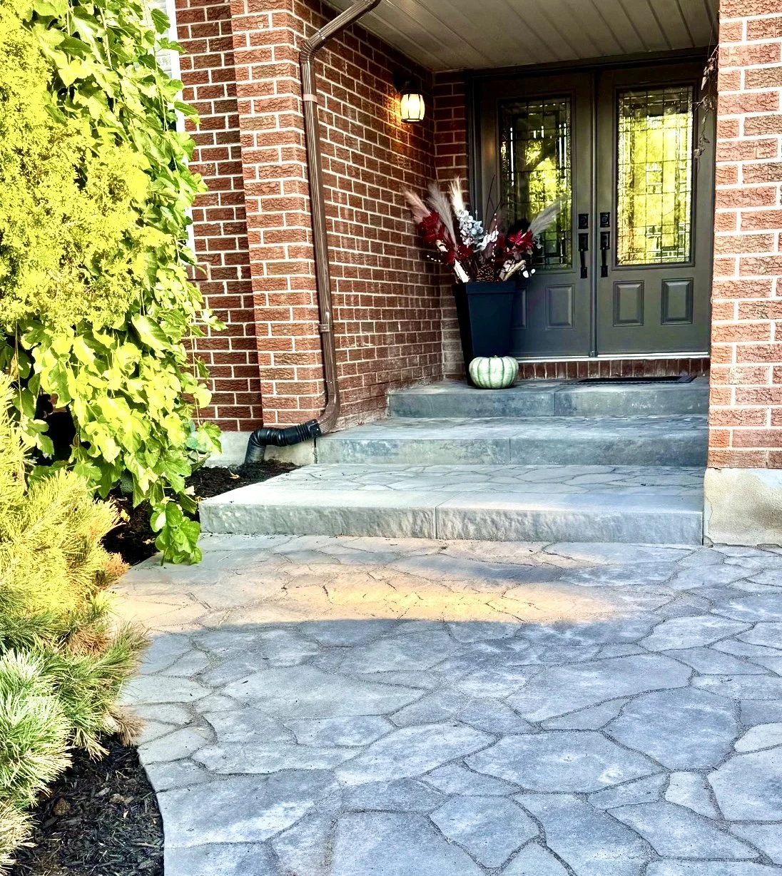 Front entrance walkway with interlock pavers at Ottawa home