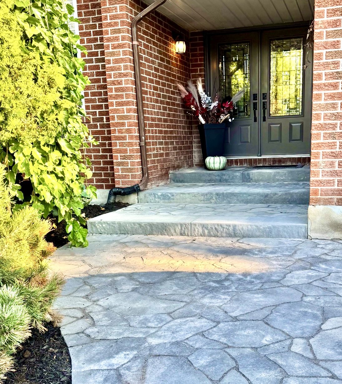 Front entrance walkway with interlock pavers at Ottawa home