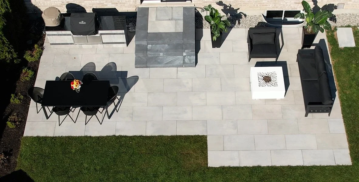 Aerial view of interlock patio with outdoor dining area in Ottawa