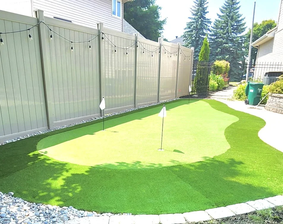 Artificial turf putting green installation in Ottawa backyard