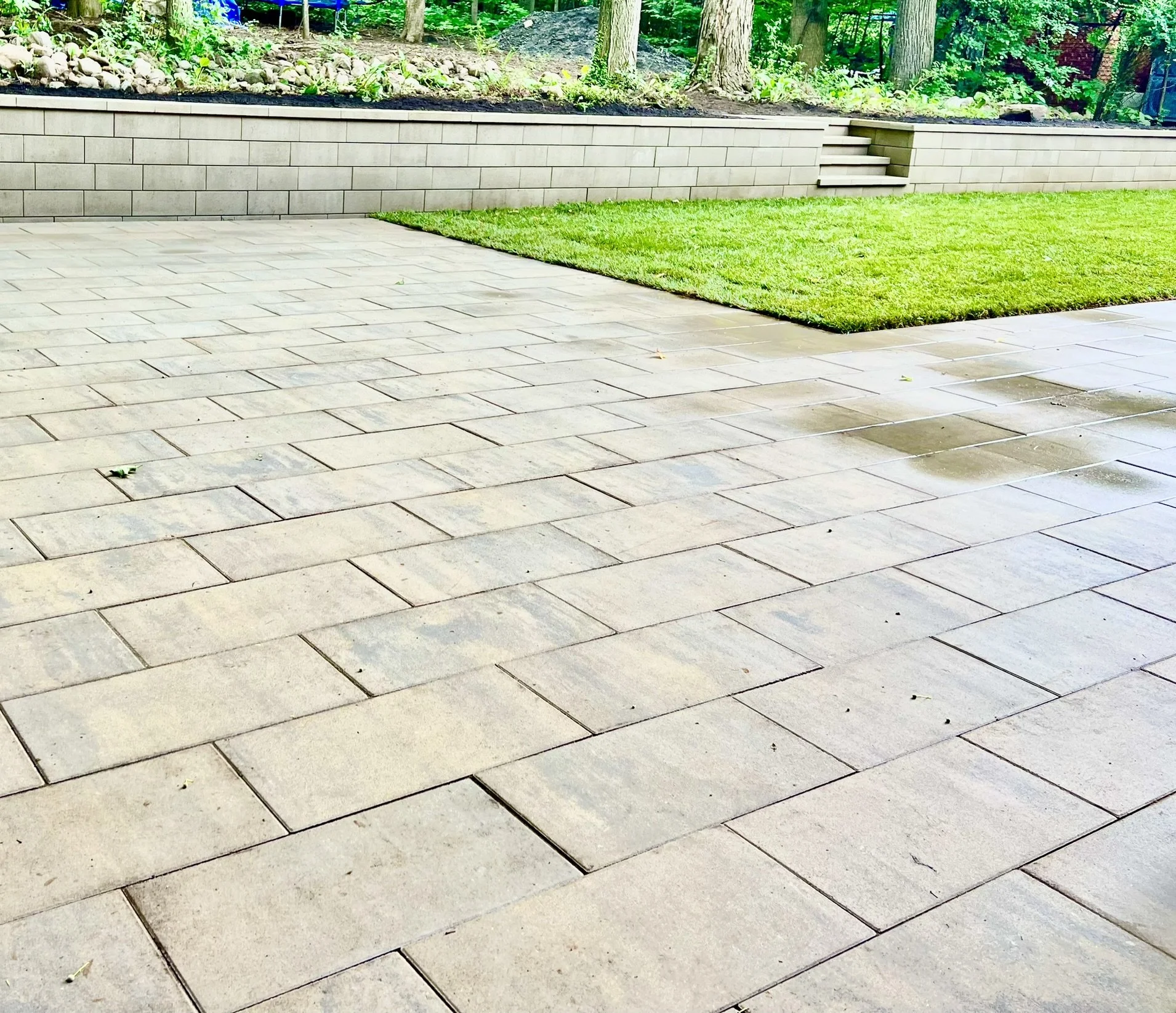 Beige interlock patio with natural stone pattern in Ottawa