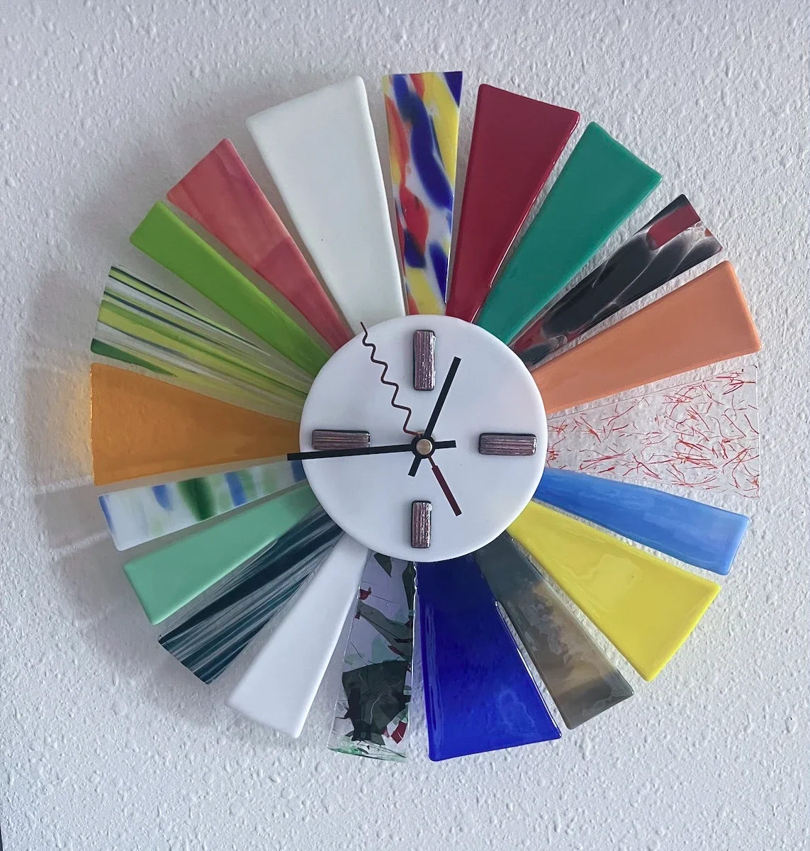 Clock made with fusible glass, fired in kiln and completed with clock mechanism
