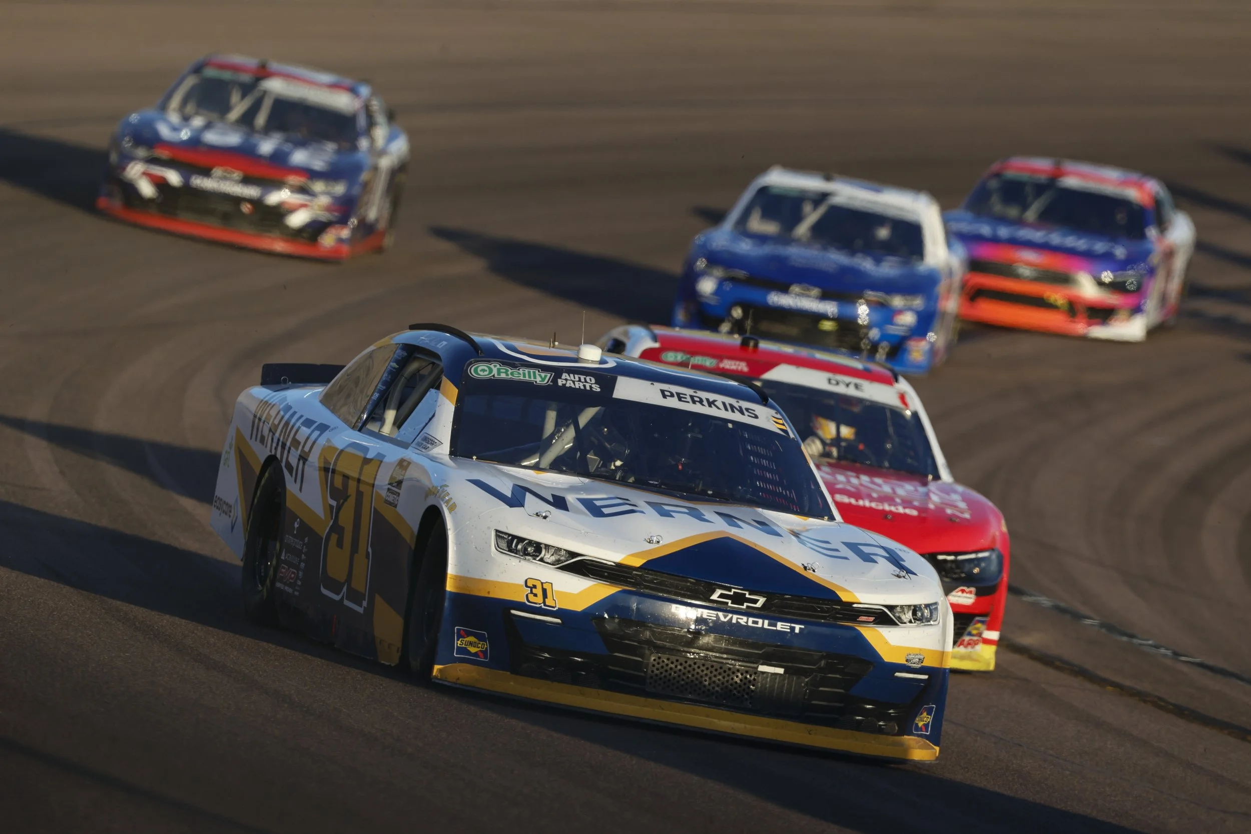 No. 31 Werner Chevrolet driven by Blaine Perkins racing in pack at Phoenix Raceway, NASCAR O'Reilly Auto Parts Series 2026