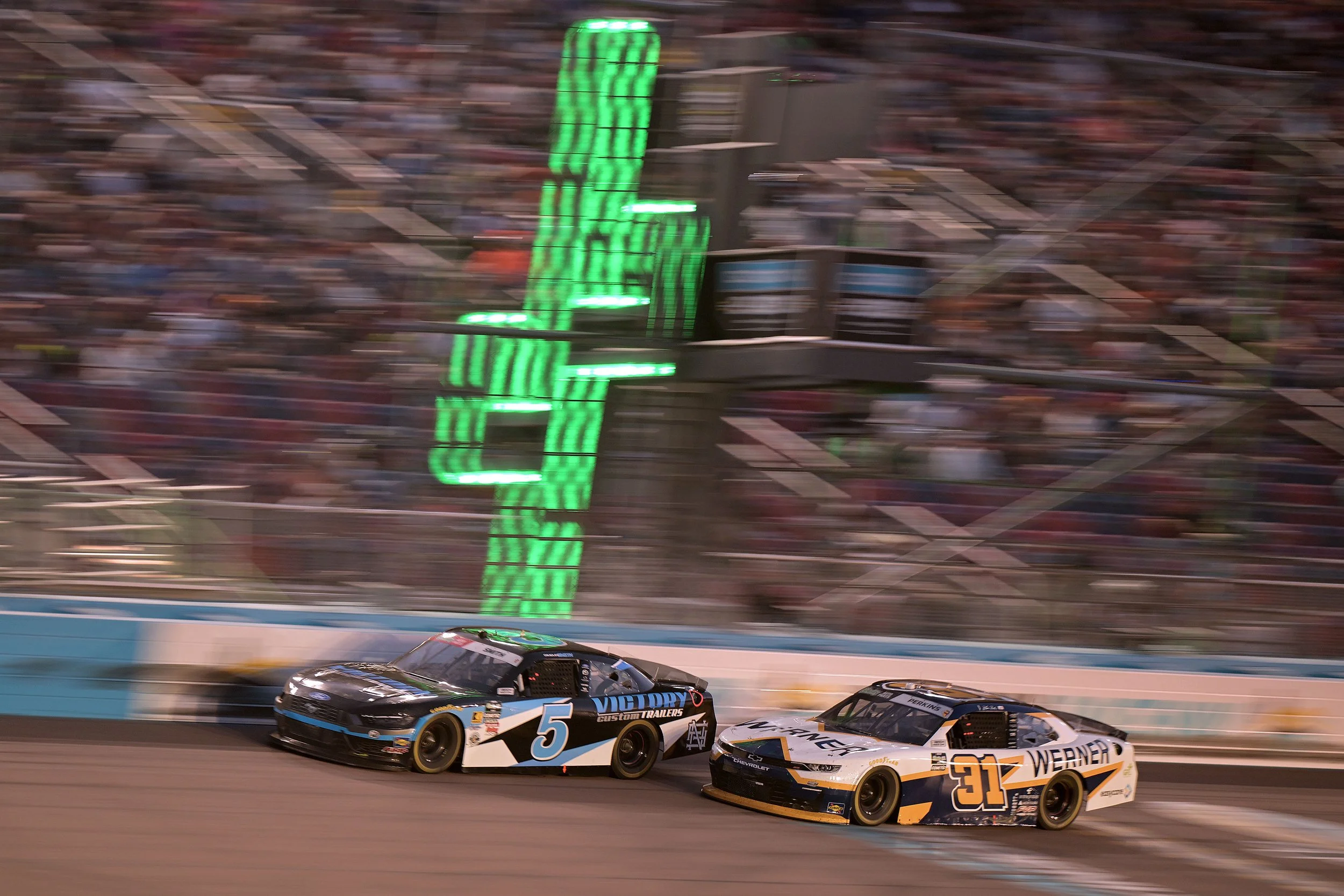 Wide angle shot of Blaine Perkins No. 31 Jordan Anderson Racing on the Phoenix Raceway oval, NASCAR O'Reilly Series 2026 Werner Trucking