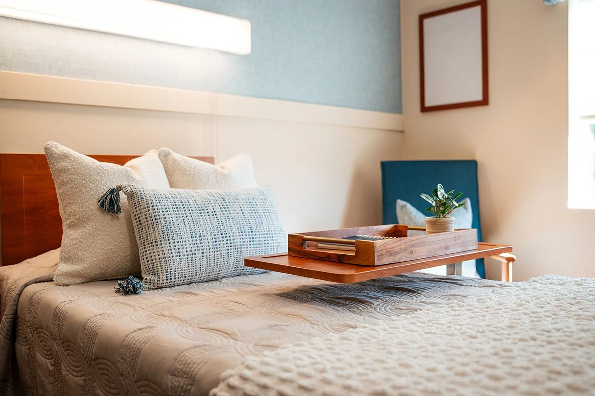 Finished resident room bed area after renovation at Hendersonville Health & Rehabilitation