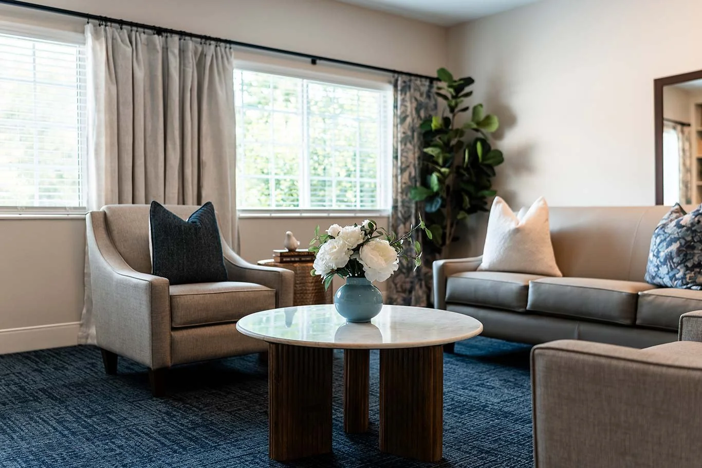 Premier-Design-Construction_HHR_Ice-Cream-Day-Room_Coffee-Table-With-Flowers.jpg